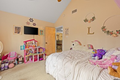 Enjoy this darling 2 bedroom & 2 bath home on two lots with two on Holly Lake Ranch Golf Club in Texas - for sale on GolfHomes.com, golf home, golf lot