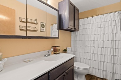 Enjoy this darling 2 bedroom & 2 bath home on two lots with two on Holly Lake Ranch Golf Club in Texas - for sale on GolfHomes.com, golf home, golf lot