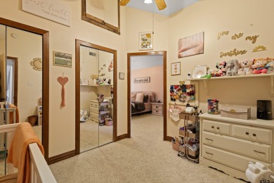 Enjoy this darling 2 bedroom & 2 bath home on two lots with two on Holly Lake Ranch Golf Club in Texas - for sale on GolfHomes.com, golf home, golf lot