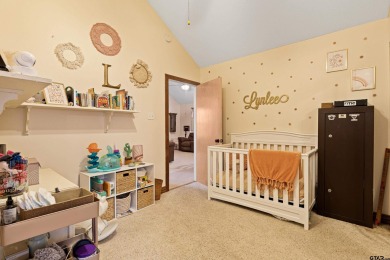 Enjoy this darling 2 bedroom & 2 bath home on two lots with two on Holly Lake Ranch Golf Club in Texas - for sale on GolfHomes.com, golf home, golf lot