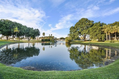 Discover the ultimate 55+ lifestyle in prestigious Wynmoor, a on Wynmoor Golf Course in Florida - for sale on GolfHomes.com, golf home, golf lot