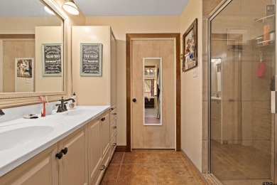 Enjoy this darling 2 bedroom & 2 bath home on two lots with two on Holly Lake Ranch Golf Club in Texas - for sale on GolfHomes.com, golf home, golf lot