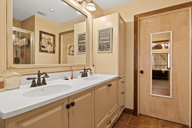 Enjoy this darling 2 bedroom & 2 bath home on two lots with two on Holly Lake Ranch Golf Club in Texas - for sale on GolfHomes.com, golf home, golf lot