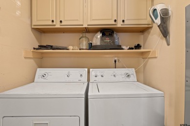 Enjoy this darling 2 bedroom & 2 bath home on two lots with two on Holly Lake Ranch Golf Club in Texas - for sale on GolfHomes.com, golf home, golf lot