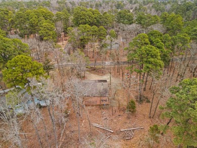 Enjoy this darling 2 bedroom & 2 bath home on two lots with two on Holly Lake Ranch Golf Club in Texas - for sale on GolfHomes.com, golf home, golf lot