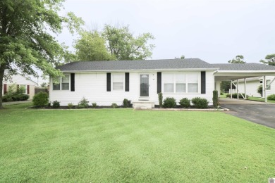 This charming 3-bedroom, 1-bathroom home offers incredible on Rolling Hills Country Club in Kentucky - for sale on GolfHomes.com, golf home, golf lot