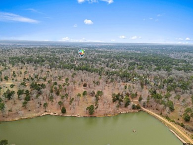 Enjoy this darling 2 bedroom & 2 bath home on two lots with two on Holly Lake Ranch Golf Club in Texas - for sale on GolfHomes.com, golf home, golf lot