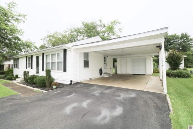 This charming 3-bedroom, 1-bathroom home offers incredible on Rolling Hills Country Club in Kentucky - for sale on GolfHomes.com, golf home, golf lot
