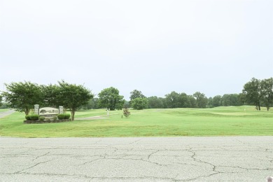 This charming 3-bedroom, 1-bathroom home offers incredible on Rolling Hills Country Club in Kentucky - for sale on GolfHomes.com, golf home, golf lot