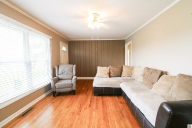 This charming 3-bedroom, 1-bathroom home offers incredible on Rolling Hills Country Club in Kentucky - for sale on GolfHomes.com, golf home, golf lot