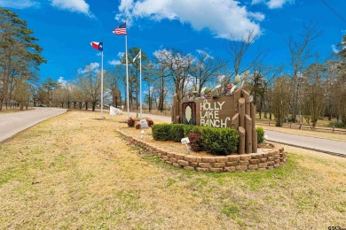 Enjoy this darling 2 bedroom & 2 bath home on two lots with two on Holly Lake Ranch Golf Club in Texas - for sale on GolfHomes.com, golf home, golf lot