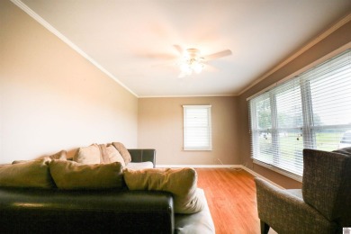 This charming 3-bedroom, 1-bathroom home offers incredible on Rolling Hills Country Club in Kentucky - for sale on GolfHomes.com, golf home, golf lot