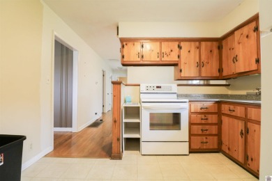 This charming 3-bedroom, 1-bathroom home offers incredible on Rolling Hills Country Club in Kentucky - for sale on GolfHomes.com, golf home, golf lot