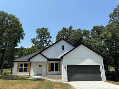 New construction home on the golf course! Enjoy this modern 4 on Diamondhead Golf and Country Club in Arkansas - for sale on GolfHomes.com, golf home, golf lot