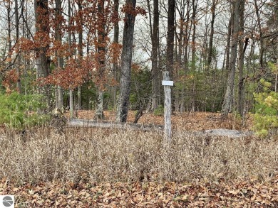 If you're in search of a quiet property, with a mix of open land on Mistwood Golf Course in Michigan - for sale on GolfHomes.com, golf home, golf lot