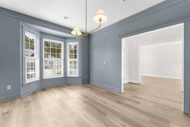 Welcome home to this beautifully refreshed residence in the on Legend Oaks Plantation Golf Club in South Carolina - for sale on GolfHomes.com, golf home, golf lot