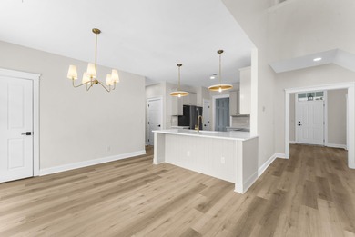 Welcome home to this beautifully refreshed residence in the on Legend Oaks Plantation Golf Club in South Carolina - for sale on GolfHomes.com, golf home, golf lot