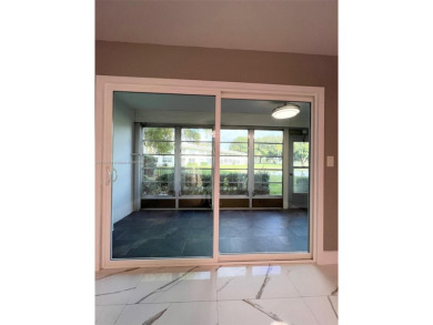 PERFECTION DOES EXIST! COME SEE THIS STUNNING HOME IN THE HEART on Wynmoor Golf Course in Florida - for sale on GolfHomes.com, golf home, golf lot