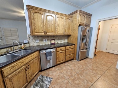 Beautiful 4-bed, 2-bath home just steps from the Andrews County on Andrews County Golf Course in Texas - for sale on GolfHomes.com, golf home, golf lot