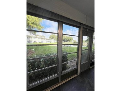 PERFECTION DOES EXIST! COME SEE THIS STUNNING HOME IN THE HEART on Wynmoor Golf Course in Florida - for sale on GolfHomes.com, golf home, golf lot