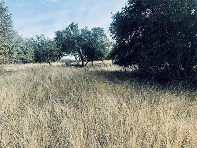 Beautiful .56-acre lot located near The Hideout Golf Course on Hideout Golf Club and Resort  in Texas - for sale on GolfHomes.com, golf home, golf lot