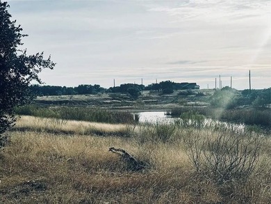 Beautiful .56-acre lot located near The Hideout Golf Course on Hideout Golf Club and Resort  in Texas - for sale on GolfHomes.com, golf home, golf lot