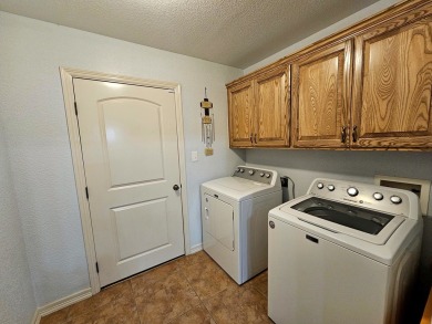 Beautiful 4-bed, 2-bath home just steps from the Andrews County on Andrews County Golf Course in Texas - for sale on GolfHomes.com, golf home, golf lot