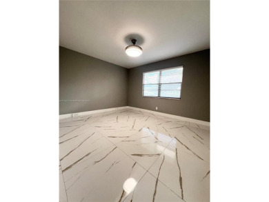 PERFECTION DOES EXIST! COME SEE THIS STUNNING HOME IN THE HEART on Wynmoor Golf Course in Florida - for sale on GolfHomes.com, golf home, golf lot