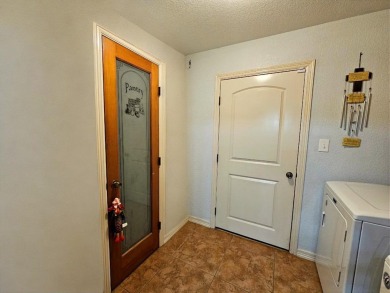 Beautiful 4-bed, 2-bath home just steps from the Andrews County on Andrews County Golf Course in Texas - for sale on GolfHomes.com, golf home, golf lot