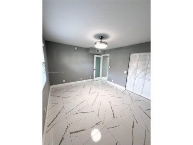 PERFECTION DOES EXIST! COME SEE THIS STUNNING HOME IN THE HEART on Wynmoor Golf Course in Florida - for sale on GolfHomes.com, golf home, golf lot