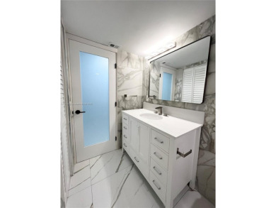 PERFECTION DOES EXIST! COME SEE THIS STUNNING HOME IN THE HEART on Wynmoor Golf Course in Florida - for sale on GolfHomes.com, golf home, golf lot