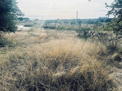 Beautiful .56-acre lot located near The Hideout Golf Course on Hideout Golf Club and Resort  in Texas - for sale on GolfHomes.com, golf home, golf lot