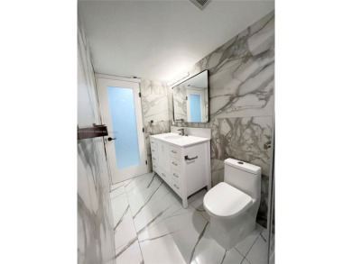 PERFECTION DOES EXIST! COME SEE THIS STUNNING HOME IN THE HEART on Wynmoor Golf Course in Florida - for sale on GolfHomes.com, golf home, golf lot