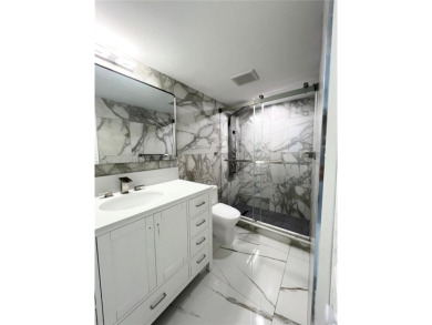 PERFECTION DOES EXIST! COME SEE THIS STUNNING HOME IN THE HEART on Wynmoor Golf Course in Florida - for sale on GolfHomes.com, golf home, golf lot