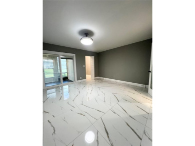 PERFECTION DOES EXIST! COME SEE THIS STUNNING HOME IN THE HEART on Wynmoor Golf Course in Florida - for sale on GolfHomes.com, golf home, golf lot