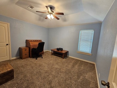 Beautiful 4-bed, 2-bath home just steps from the Andrews County on Andrews County Golf Course in Texas - for sale on GolfHomes.com, golf home, golf lot
