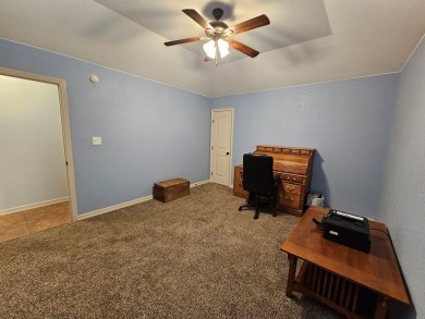 Beautiful 4-bed, 2-bath home just steps from the Andrews County on Andrews County Golf Course in Texas - for sale on GolfHomes.com, golf home, golf lot