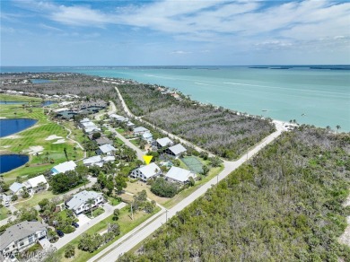 Discover modern coastal luxury at 982 Sand Castle Road, a fully on The Dunes Golf and Tennis Club in Florida - for sale on GolfHomes.com, golf home, golf lot