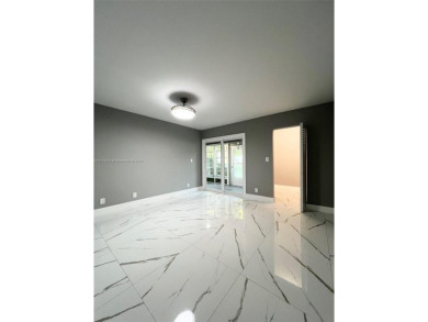PERFECTION DOES EXIST! COME SEE THIS STUNNING HOME IN THE HEART on Wynmoor Golf Course in Florida - for sale on GolfHomes.com, golf home, golf lot
