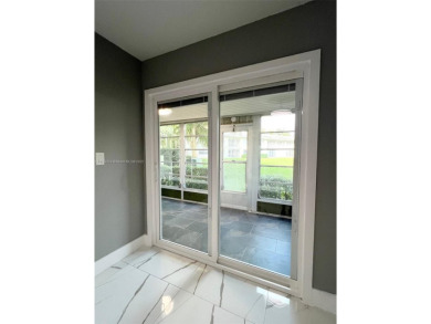 PERFECTION DOES EXIST! COME SEE THIS STUNNING HOME IN THE HEART on Wynmoor Golf Course in Florida - for sale on GolfHomes.com, golf home, golf lot
