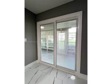 PERFECTION DOES EXIST! COME SEE THIS STUNNING HOME IN THE HEART on Wynmoor Golf Course in Florida - for sale on GolfHomes.com, golf home, golf lot