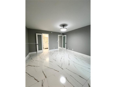PERFECTION DOES EXIST! COME SEE THIS STUNNING HOME IN THE HEART on Wynmoor Golf Course in Florida - for sale on GolfHomes.com, golf home, golf lot