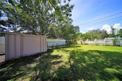 Across the street from GOLF COURSE and Playground ,this charming on Mangrove Bay Golf Course in Florida - for sale on GolfHomes.com, golf home, golf lot