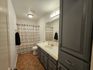 Beautiful 4-bed, 2-bath home just steps from the Andrews County on Andrews County Golf Course in Texas - for sale on GolfHomes.com, golf home, golf lot