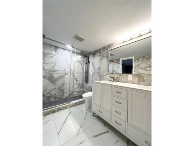 PERFECTION DOES EXIST! COME SEE THIS STUNNING HOME IN THE HEART on Wynmoor Golf Course in Florida - for sale on GolfHomes.com, golf home, golf lot