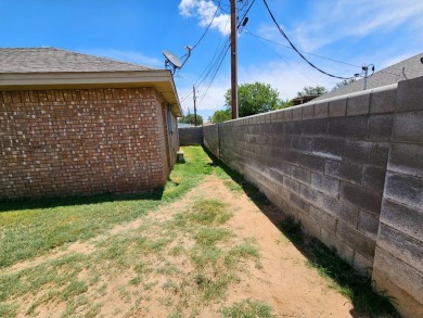 Beautiful 4-bed, 2-bath home just steps from the Andrews County on Andrews County Golf Course in Texas - for sale on GolfHomes.com, golf home, golf lot