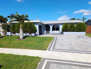 Beautifully maintained 2BR/2BA home in Sunrise Golf Village! on Sunrise Lakes Phase III in Florida - for sale on GolfHomes.com, golf home, golf lot