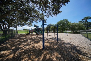 Across the street from GOLF COURSE and Playground ,this charming on Mangrove Bay Golf Course in Florida - for sale on GolfHomes.com, golf home, golf lot