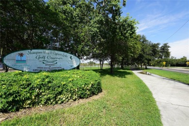 Across the street from GOLF COURSE and Playground ,this charming on Mangrove Bay Golf Course in Florida - for sale on GolfHomes.com, golf home, golf lot