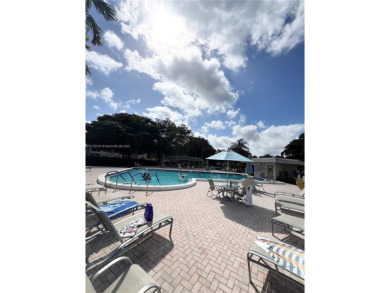 PERFECTION DOES EXIST! COME SEE THIS STUNNING HOME IN THE HEART on Wynmoor Golf Course in Florida - for sale on GolfHomes.com, golf home, golf lot
